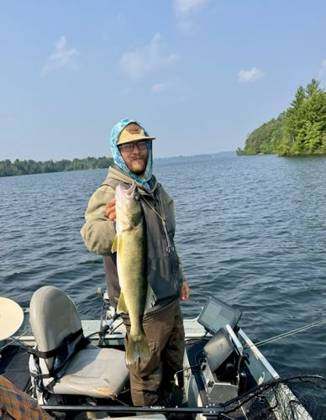 Nick Walters holding a big walleye